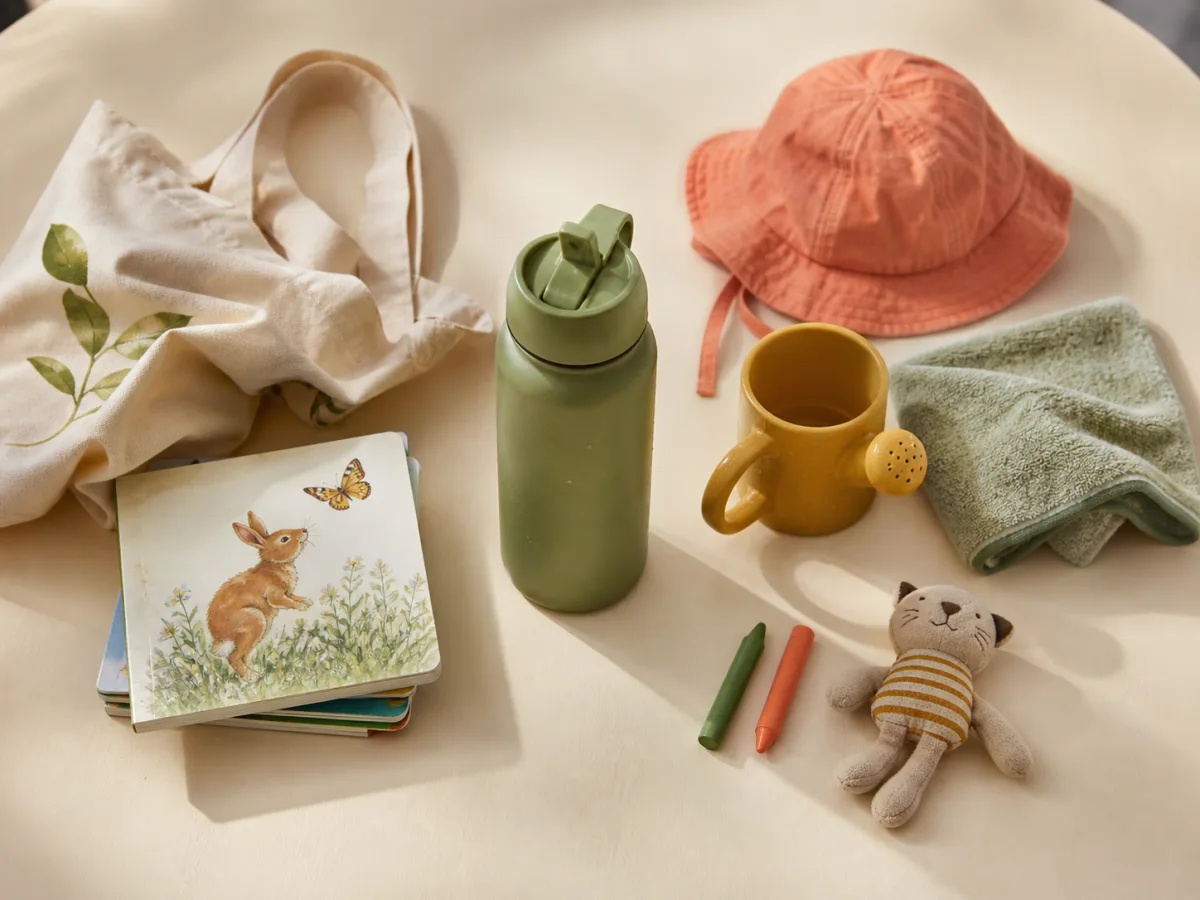Simple hot-day toddler essentials arranged for indoor, water-play, or stay-home options